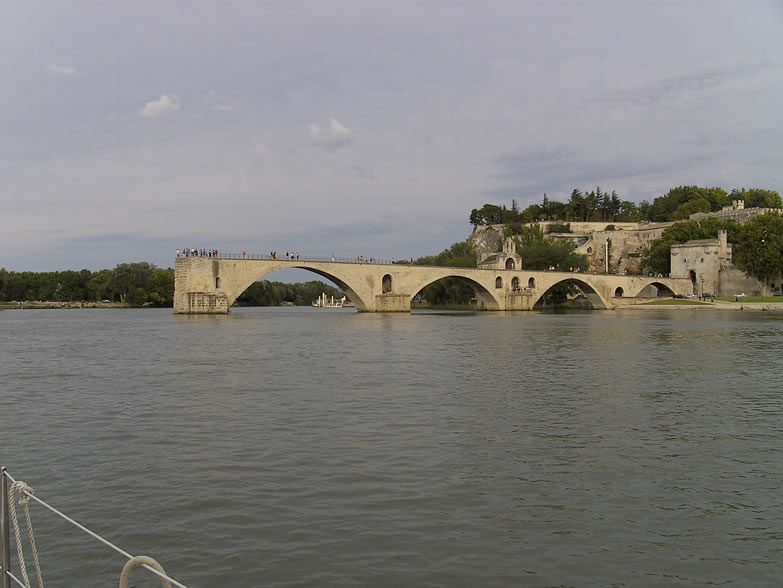 Arrival at AVIGNON, the famous PONT BENEZET XIIth between K242 and 241 in the BRAS D AVIGNON, in the background the harbour, on the high the gardens and behind the PALAIS DES PAPES